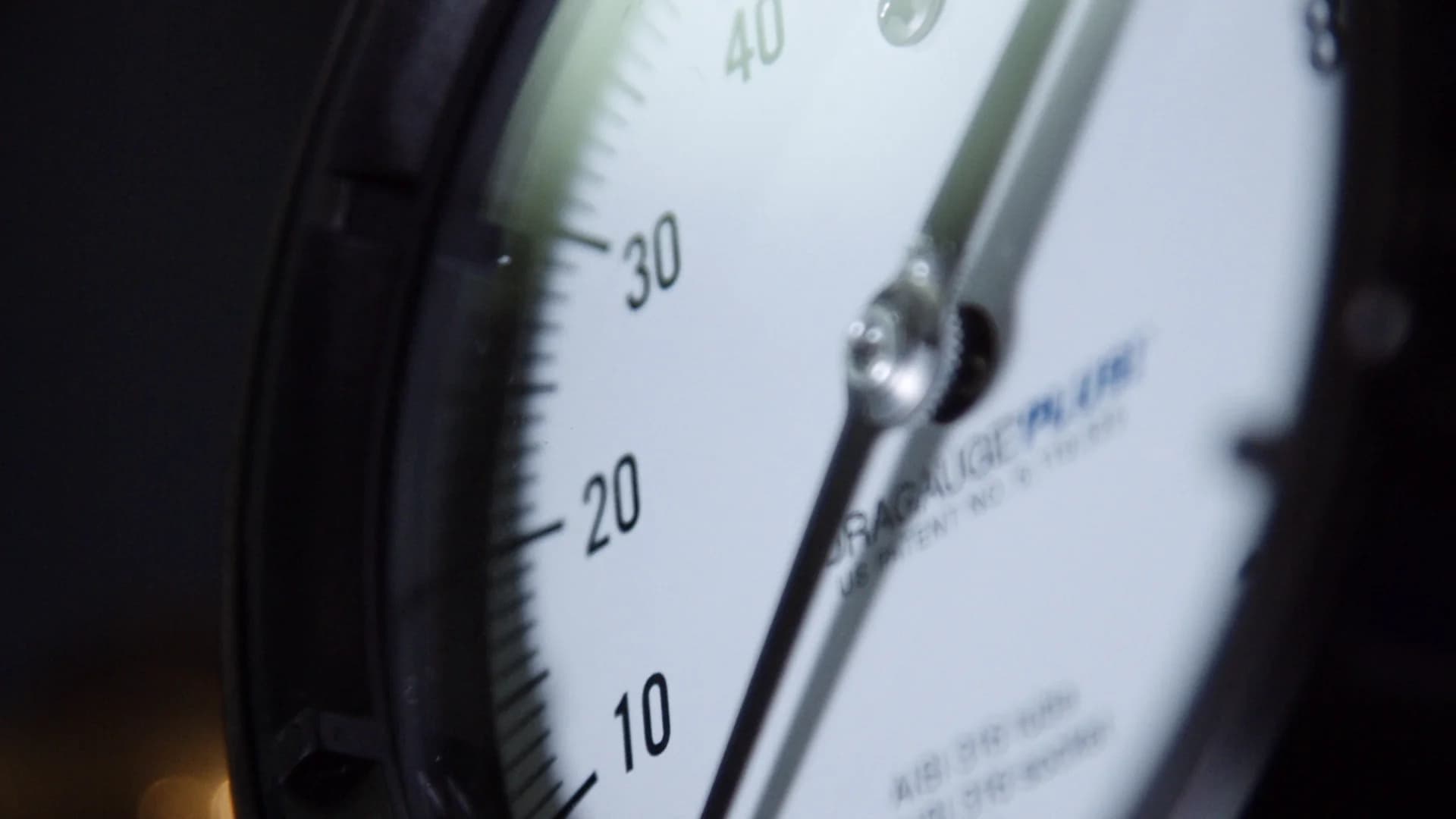 Close-up of a pressure gauge measuring around 20 units.