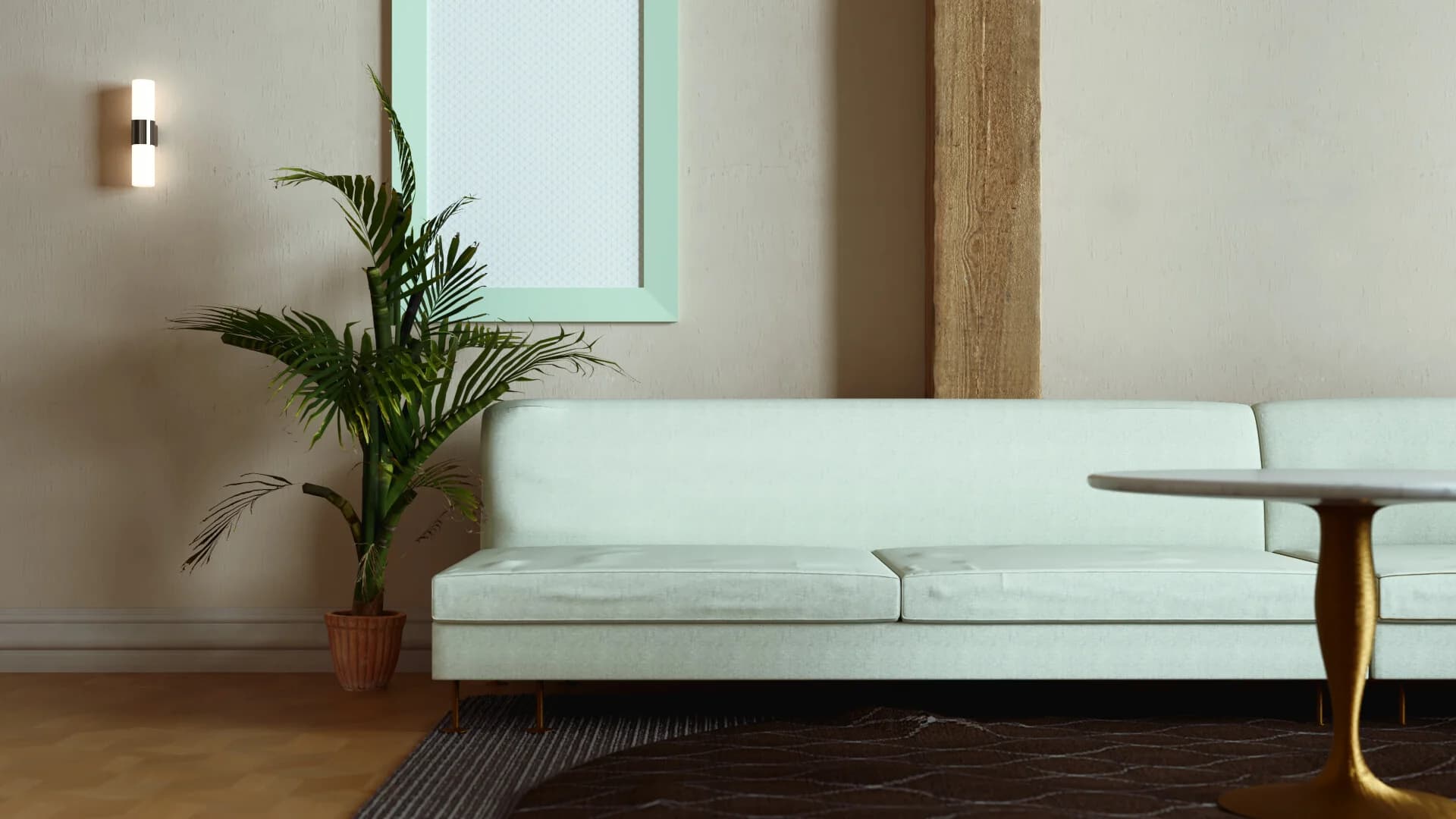 Modern living room with a light green sofa, stylish table, and decorative plant against a neutral wall.